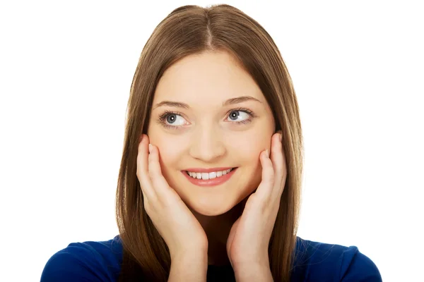 Happy thoughtful woman looking up. — Stock Photo, Image