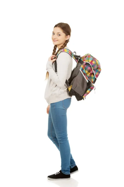 Mulher adolescente feliz com mochila . — Fotografia de Stock