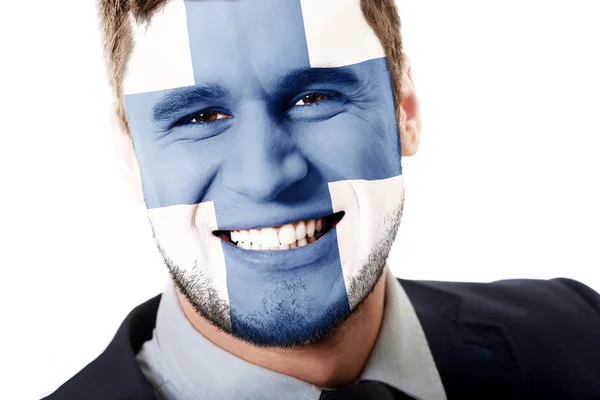 Glücklicher Mann mit finnischer Flagge im Gesicht. — Stockfoto