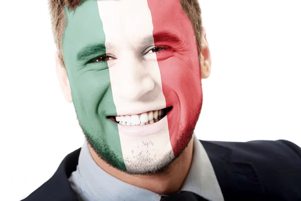 Homem feliz com a bandeira do México na cara . — Fotografia de Stock