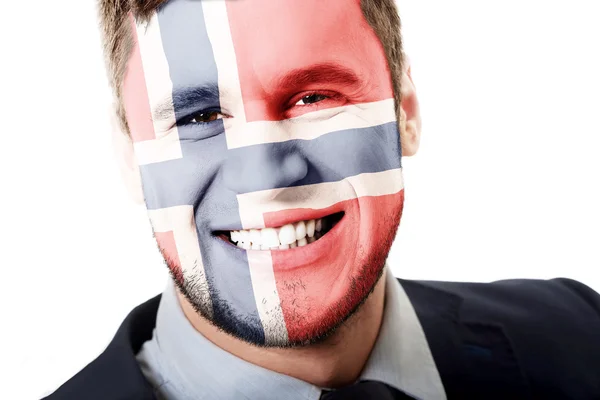 Lycklig man med Norge flagga på ansikte. — Stockfoto