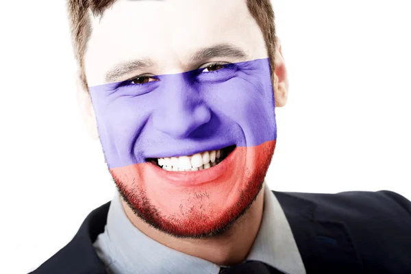 Hombre feliz con bandera de Rusia en la cara . — Foto de Stock