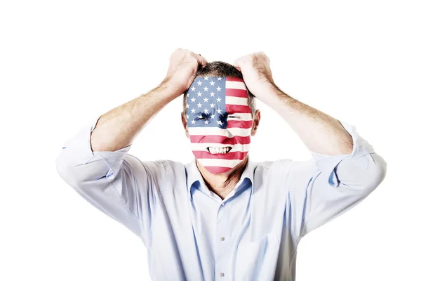 Älterer Mann mit US-Fahne im Gesicht. — Stockfoto