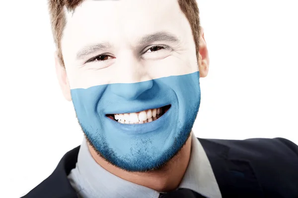 Glücklicher Mann mit San Marino-Fahne im Gesicht. — Stockfoto