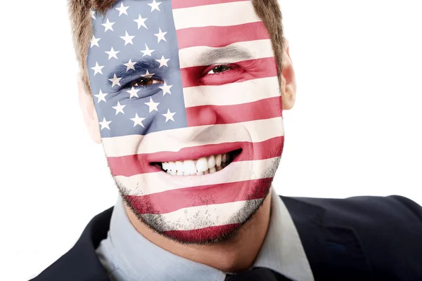 Gelukkig man met Usa vlag op gezicht. — Stockfoto
