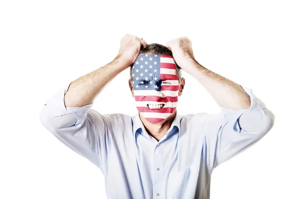 Mature man with usa flag on face. Stock Picture