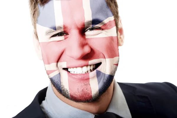 Ευτυχισμένος άνθρωπος με μεγάλη Βρετανία σημαία στο πρόσωπό. — Φωτογραφία Αρχείου