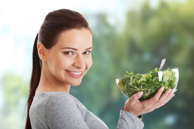 Kuzu marul yiyen Kadın.