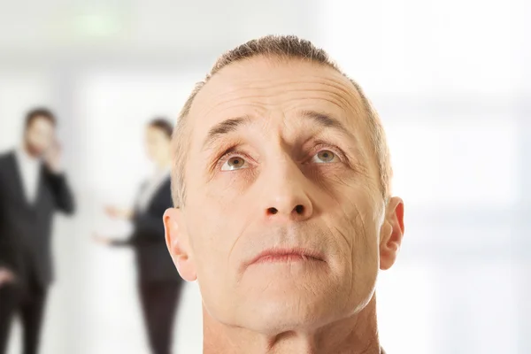 Mature man looking up. — Stock Photo, Image