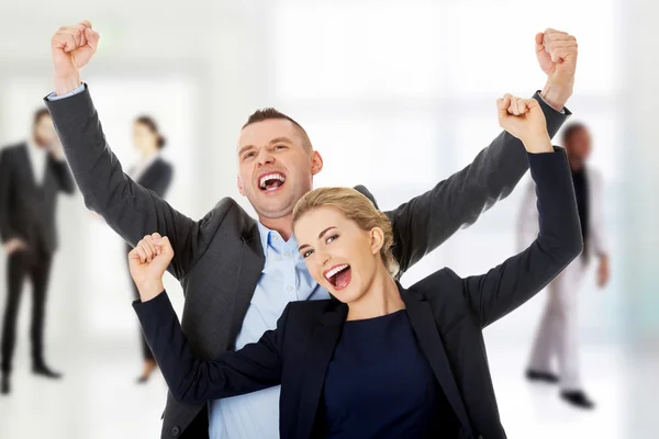Successful business couple laughing. — Stock Photo, Image