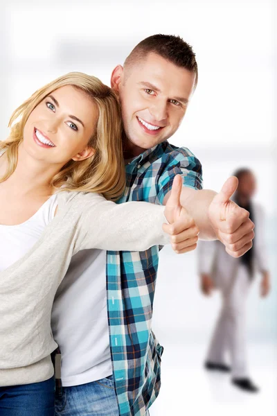 Couple showing thumbs up — Stock Photo, Image