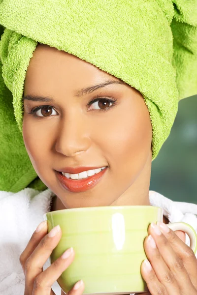 Spa woman in bathrobe with a cup. — Stock Photo, Image