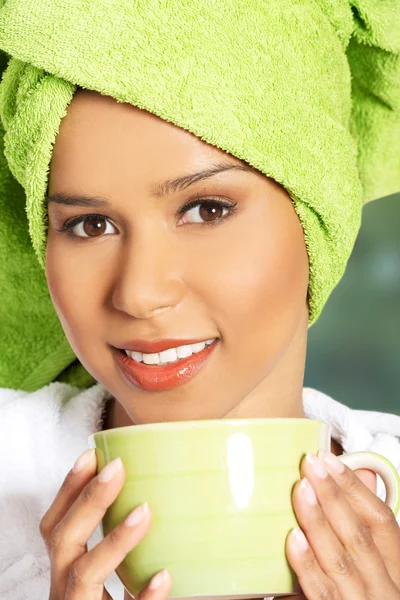 Mujer spa en albornoz con una taza . —  Fotos de Stock