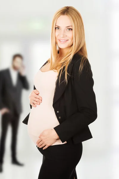 Happy Pregnant businesswoman. Stock Picture