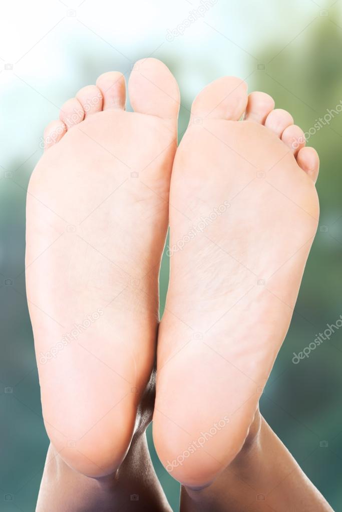 Female bare toes and heels.