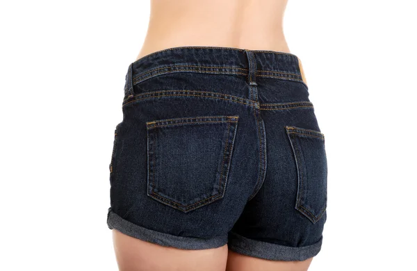 Sexy vrouw in jeans shorts. — Stockfoto