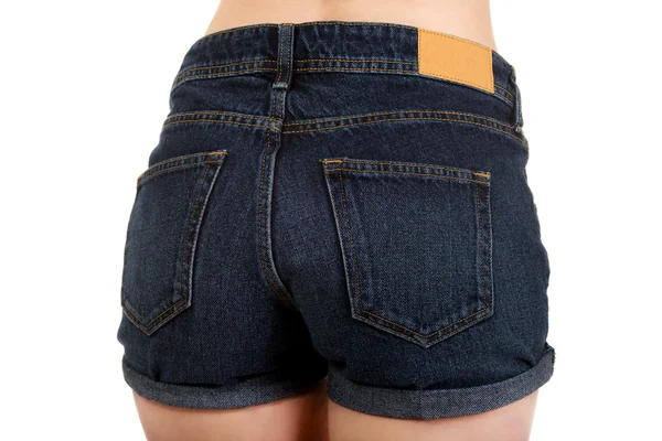 Sexy vrouw in jeans shorts. — Stockfoto