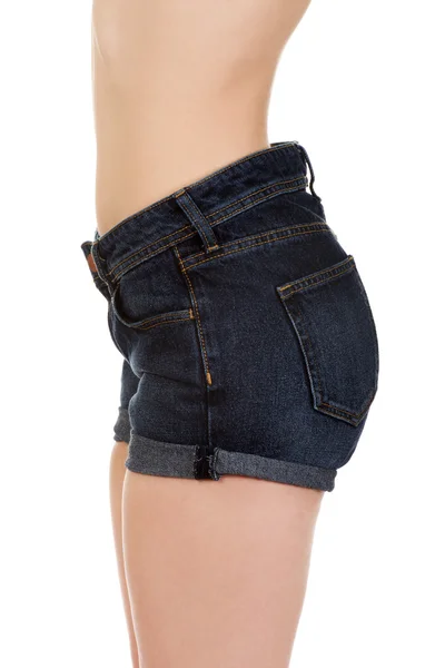 Sexig kvinna i jeans shorts. — Stockfoto