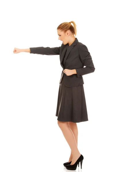 Businesswoman screaming and shaking her fist. — Stock Photo, Image