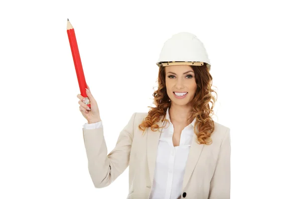 Architect woman pointing up with pencil. — Stock Photo, Image