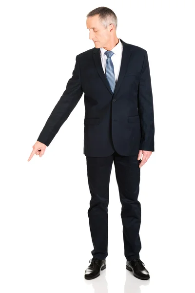 Businessman pointing down — Stock Photo, Image