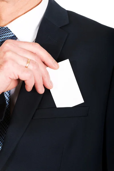Uomo d'affari che prende una carta bianca dalla tasca — Foto Stock