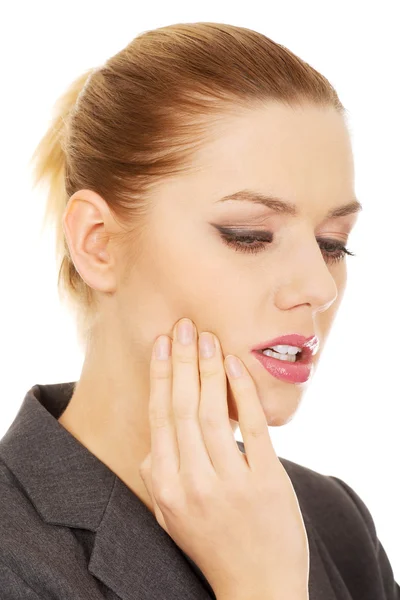 Businesswoman with tooth ache. — Stock Photo, Image