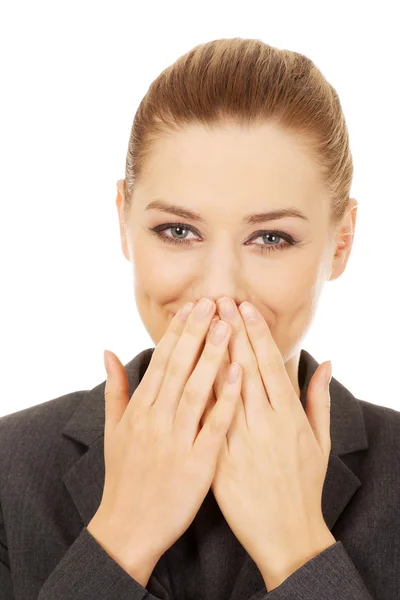 Geschäftsfrau bedeckt Mund mit Händen. — Stockfoto