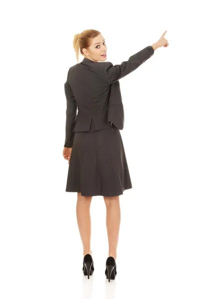 Businesswoman pointing up. — Stock Photo, Image