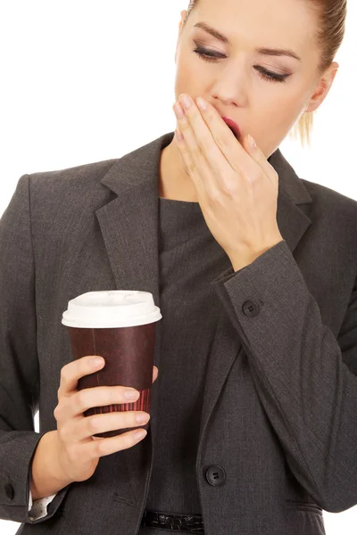 Empresária cansada com um café . — Fotografia de Stock