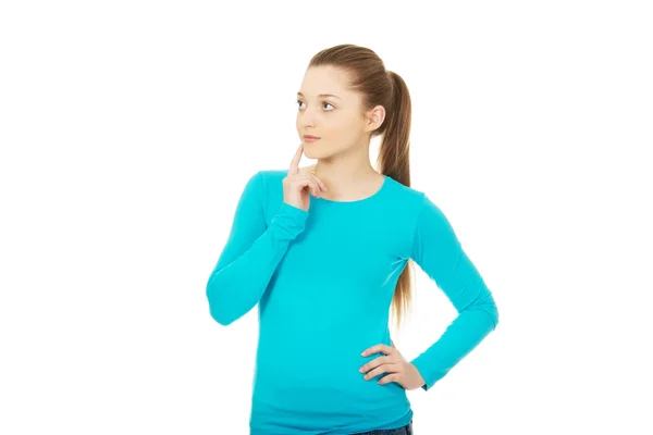 Beautiful thoughtful woman looking up. — Stock Photo, Image