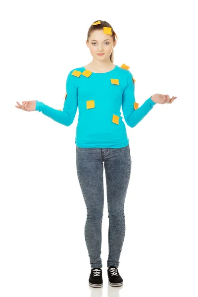 Young woman covered with post it notes. — Stock Photo, Image