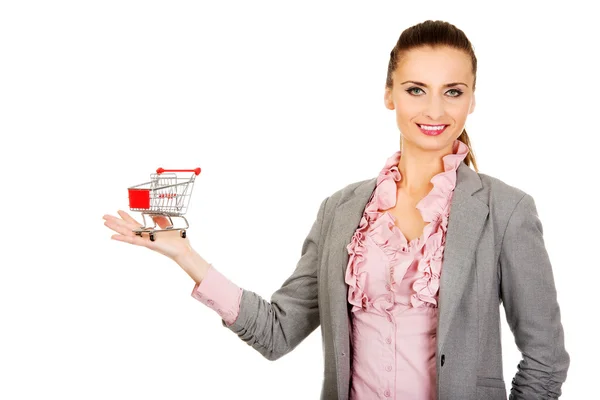 Mujer de negocios con carrito de compras. — Foto de Stock