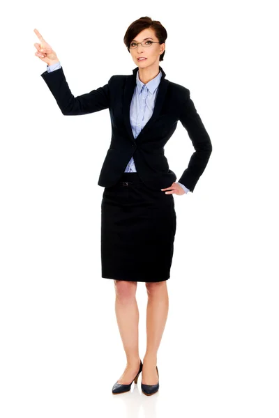 Geschäftsfrau zeigt nach oben. — Stockfoto