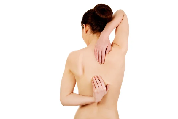 Kadına arkadan sırt ağrısı — Stok fotoğraf