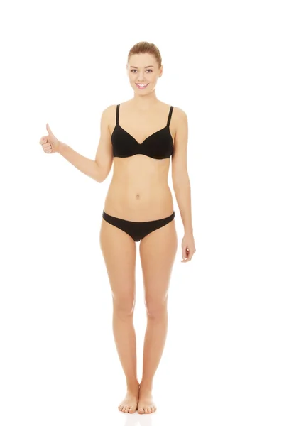 Woman in bikini with thumbs up. — Stock Photo, Image