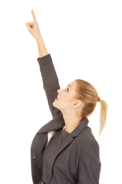 Businesswoman pointing up. — Stock Photo, Image