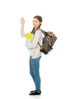 elini sallayarak kız öğrenci.