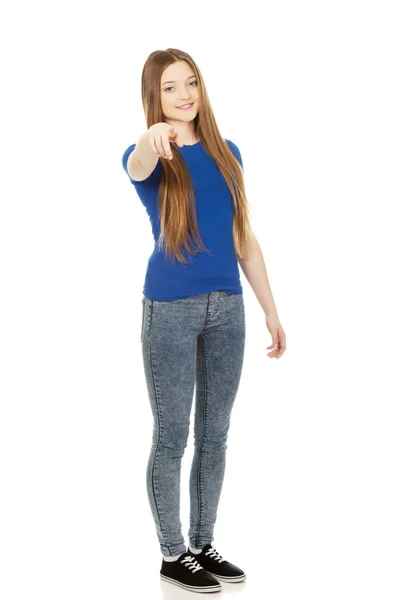 Smiling young woman pointing on you. — Stock Photo, Image