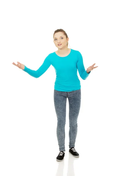 Teen woman holding something on hands. — Stock Photo, Image