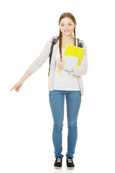 Estudante apontando para baixo . — Fotografia de Stock