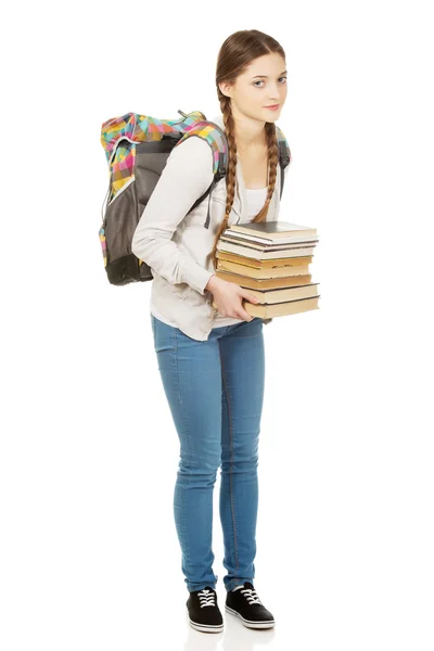 Belle adolescente avec sac à dos et livres . — Photo