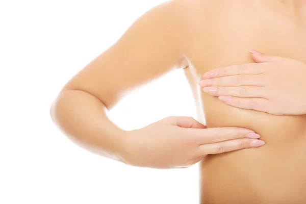 Woman examining breast. — Stock Photo, Image