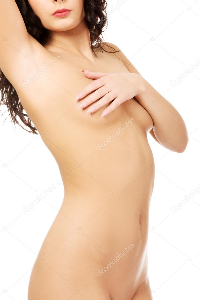 Slim woman covering her breast.