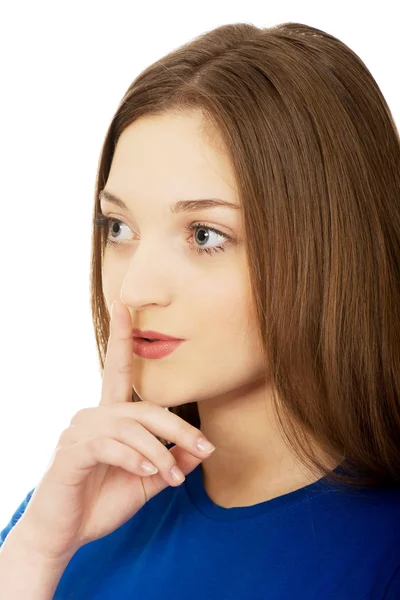 Adolescente mujer con gesto de silencio . —  Fotos de Stock