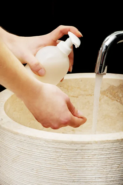 Woman cleaning her hands. — Stock Photo, Image