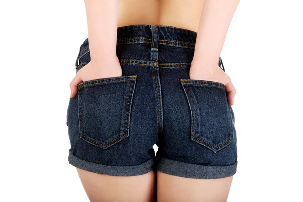 Sexy vrouw in jeans shorts. — Stockfoto