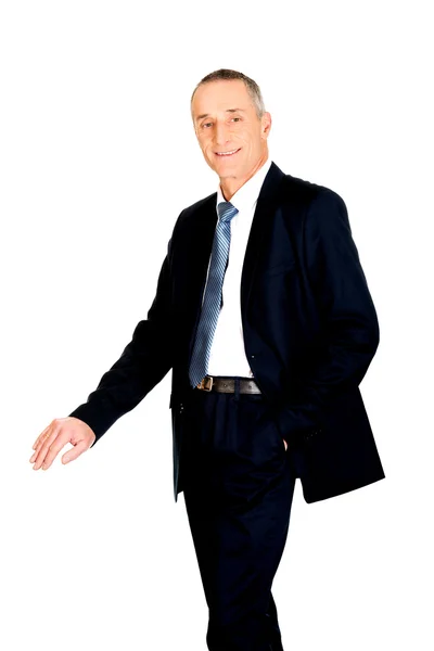 Mature businessman leaning on empty blank — Stock Photo, Image