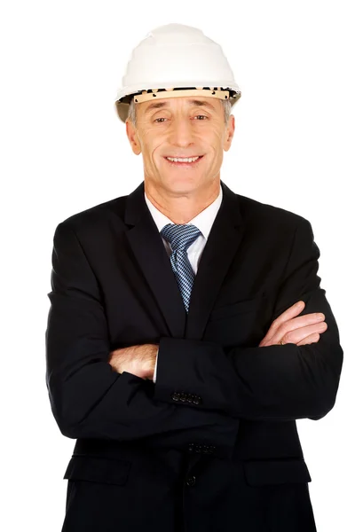 Smiling businessman with hard hat — Stock Photo, Image