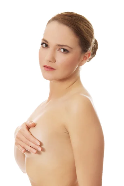 Young topless woman covering her breast. — Stock Photo, Image